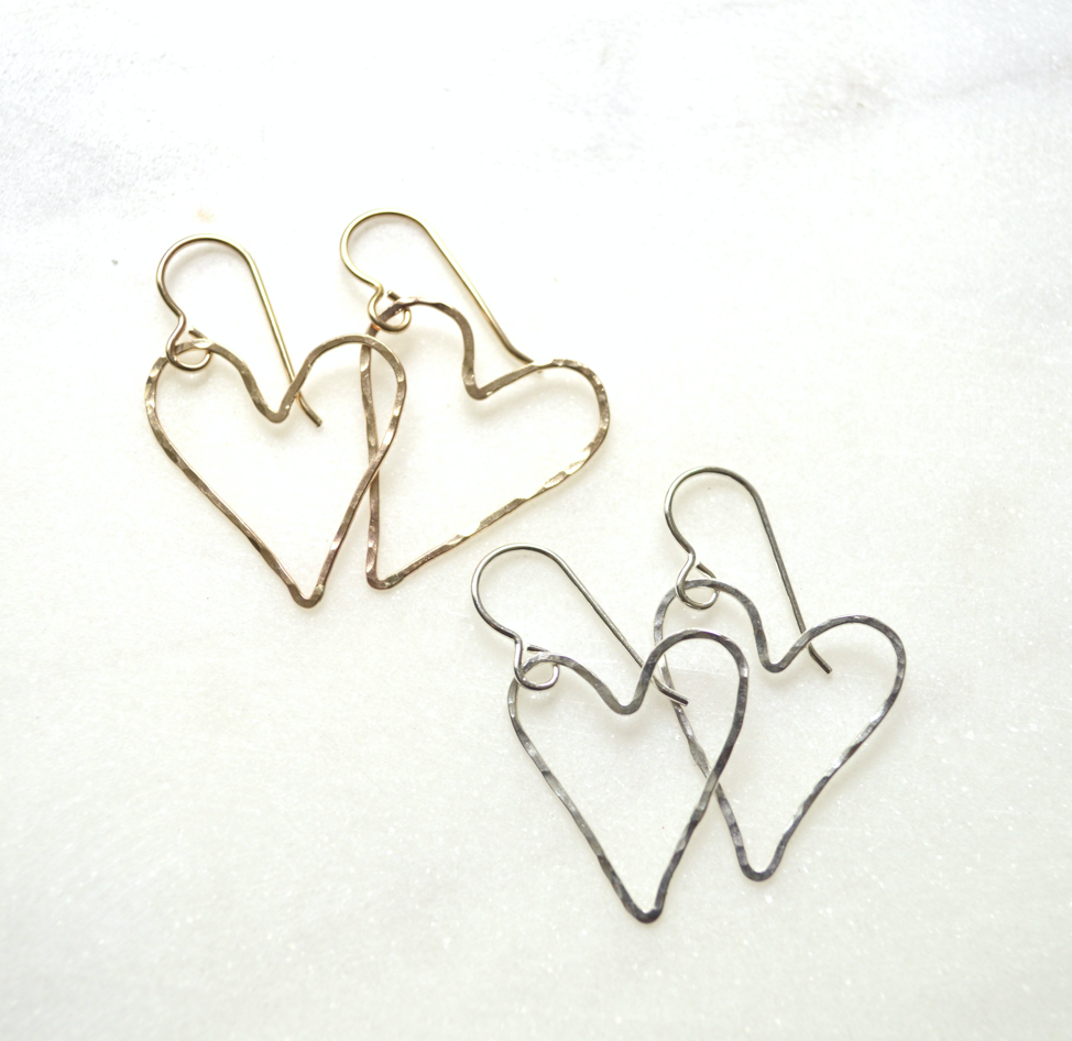 Heart-shaped earrings on a white background