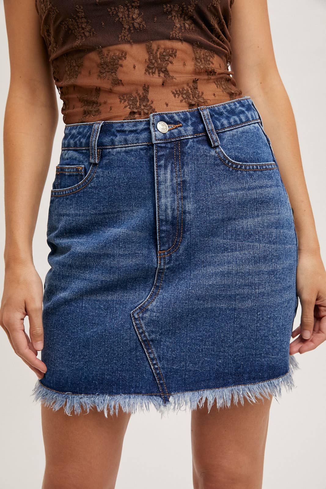 HIGH-WAIST DENIM RAW HEM MINI SKIRT