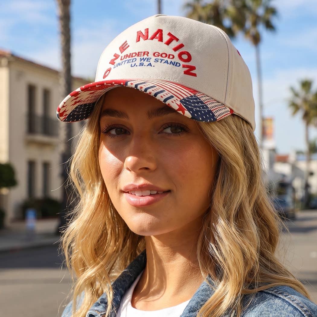 Woman wearing a cap with patriotic design outdoors