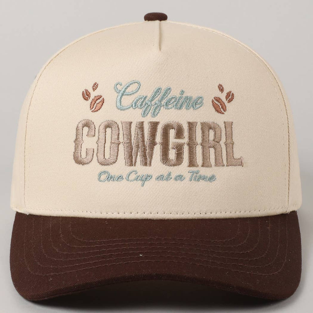Beige and brown cap with 'Caffeine Cowgirl' text on a gray background