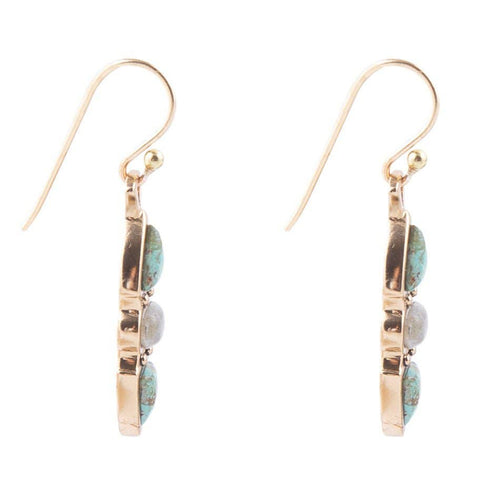 A pair of gold drop earrings featuring three oval turquoise and gray stone beads set in a vertical bar, suspended from gold fishhook wires, shown against a plain white background.