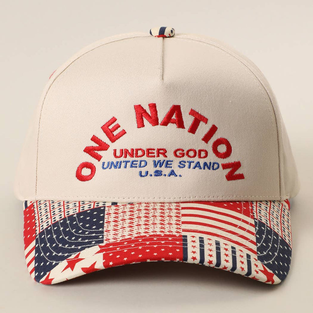 Cap with 'One Nation Under God' text and American flag design on a beige background