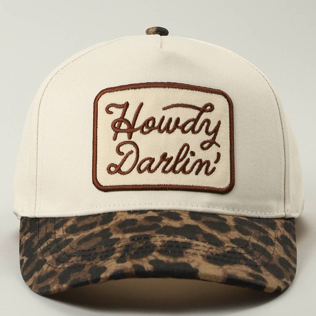 Cap with 'Howdy Darlin' logo on a white background