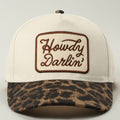 Cap with 'Howdy Darlin' logo on a white background
