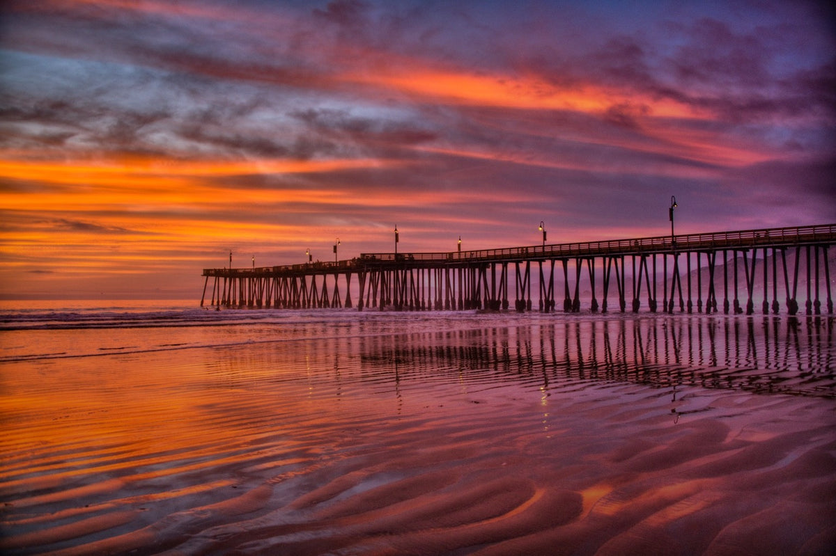Sunset over Pismo Beach Pier in Pismo Beach, California 